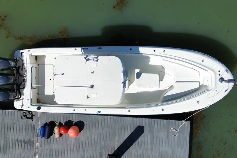 Slide: The Image of Aerial view of 2004 Hydra-Sports Vector 3300 CC docked on calm water. - 40
