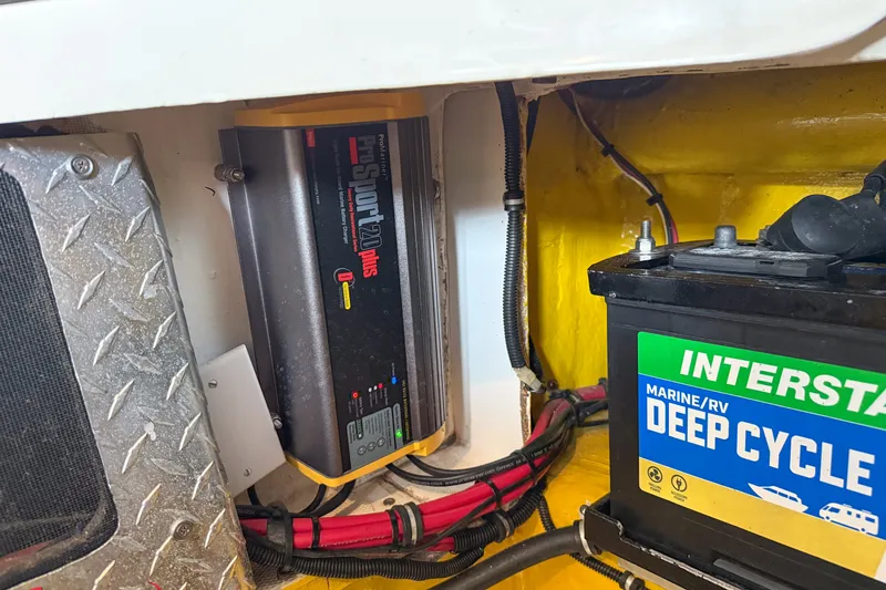 Slide: The Image of Marine battery setup in a 2000 Sonic 45 SS boat, featuring Interstate Deep Cycle battery. - 35