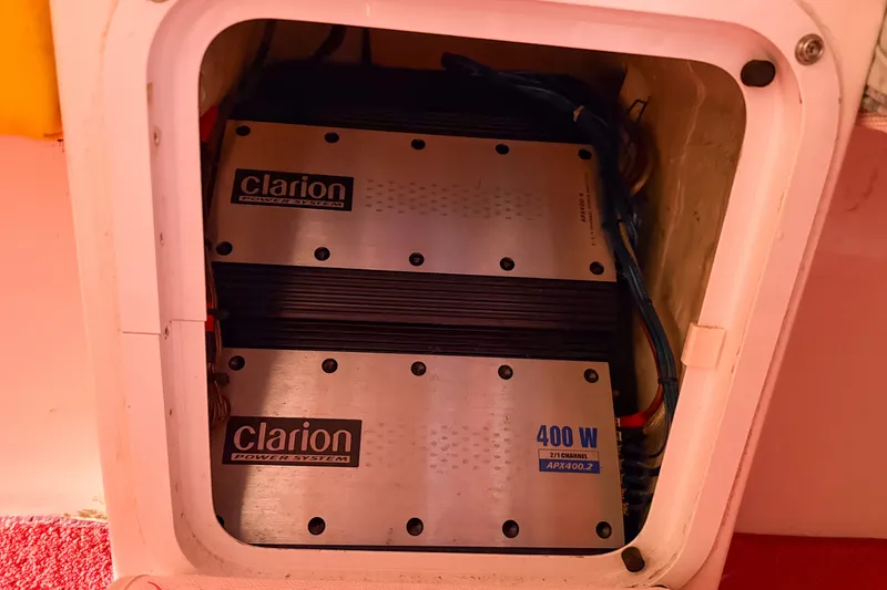 Slide: The Image of Clarion power system amplifiers in a 2000 Sonic 45 SS boat compartment. - 23