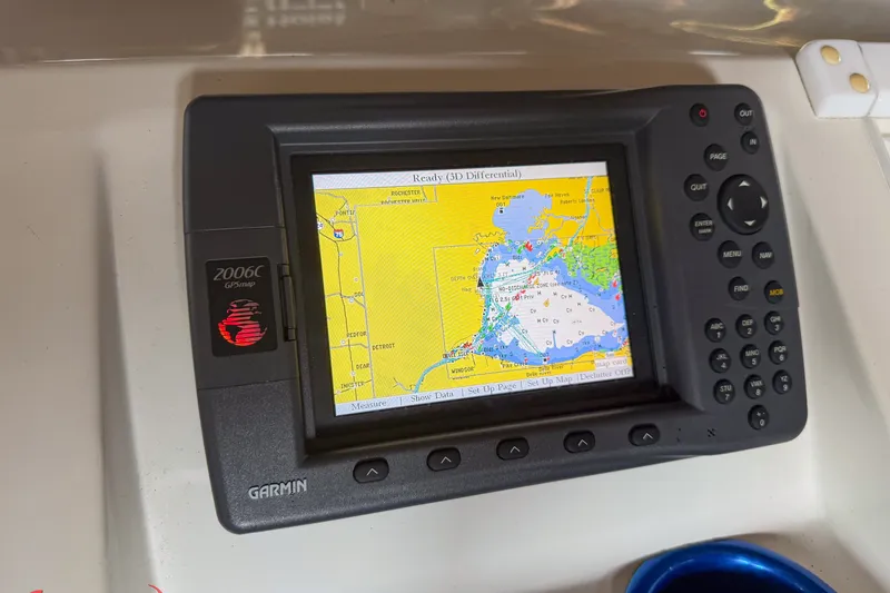 Slide: The Image of Garmin GPSmap 2006C displaying a nautical chart, installed on a 2000 Sonic 45 SS boat. - 25
