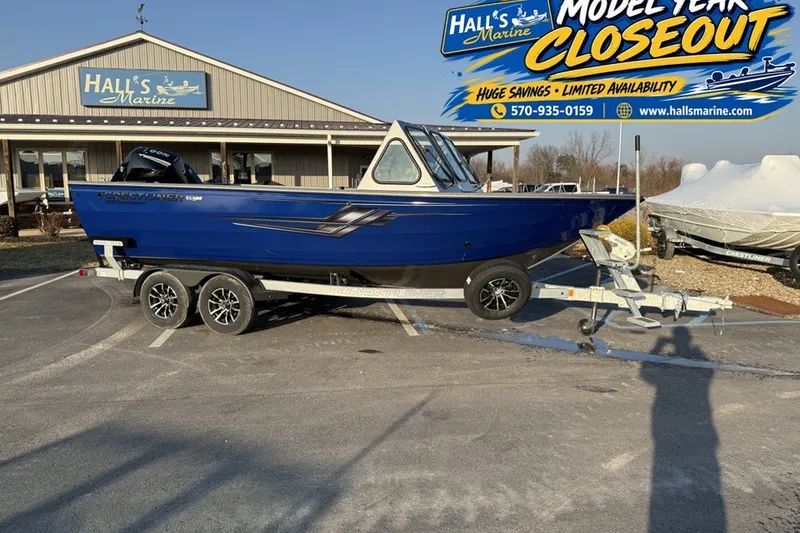 The Image of 2026 Crestliner 2050 Commander boat on trailer at Hall's Marine closeout sale. - 0