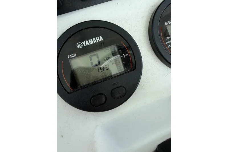 Slide: The Image of Yamaha tachometer display on 2017 Sea Hunt Ultra 211 boat dashboard. - 8