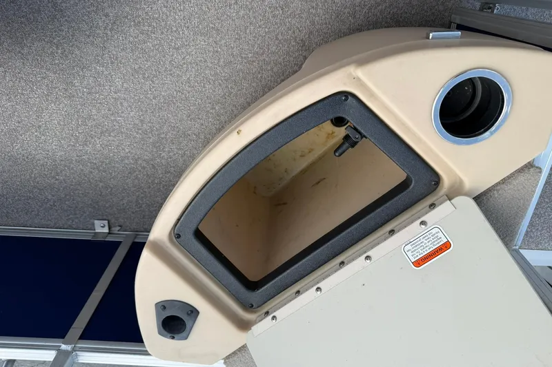 Slide: The Image of Storage compartment on a 2016 Sun Tracker Fishin' Barge 20 DLX boat. - 17