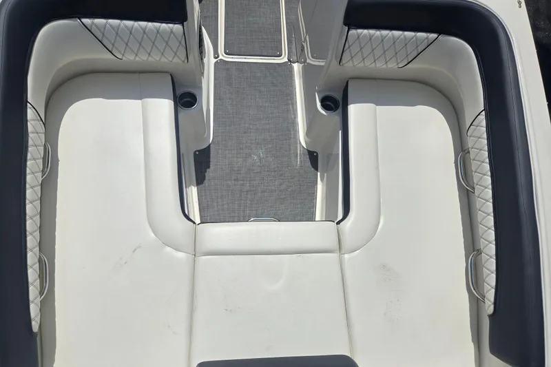 Slide: The Image of Interior seating of a 2020 Bayliner DX 2250 boat with cushioned upholstery. - 20
