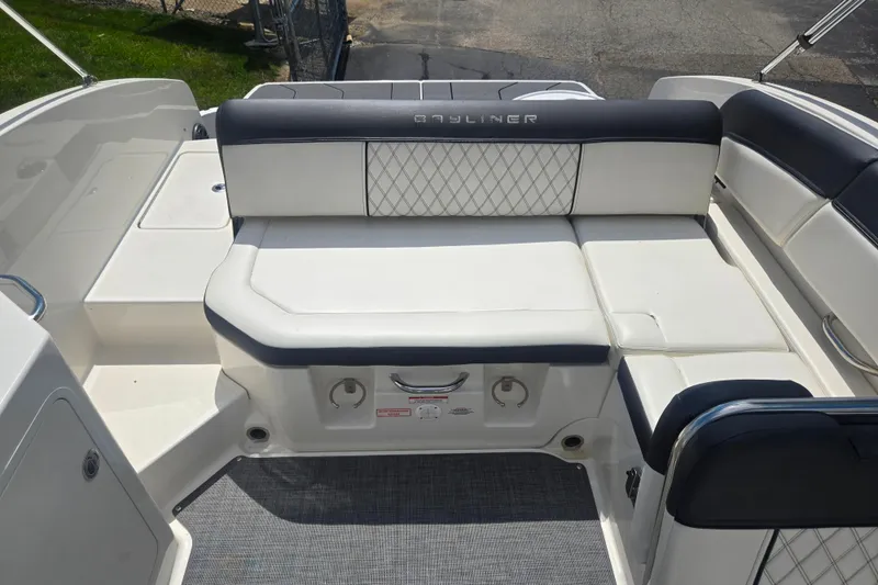 Slide: The Image of Bayliner DX 2250 boat interior, 2020 model, featuring white and black seating. - 23