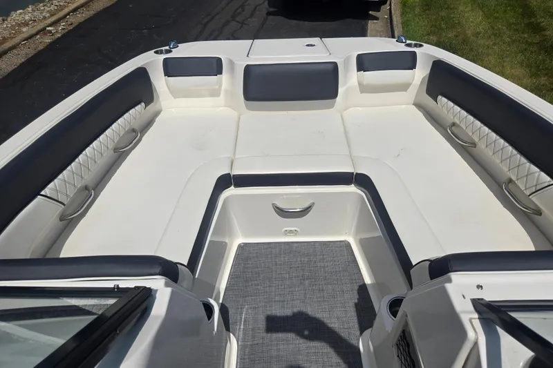 Slide: The Image of Bayliner DX 2250 boat interior, 2020 model, featuring spacious seating and modern design. - 18