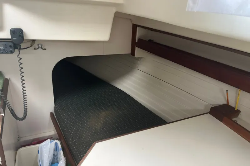 Slide: The Image of Interior cabin of a 1976 Pearson 10M sailboat with a cozy sleeping berth. - 22