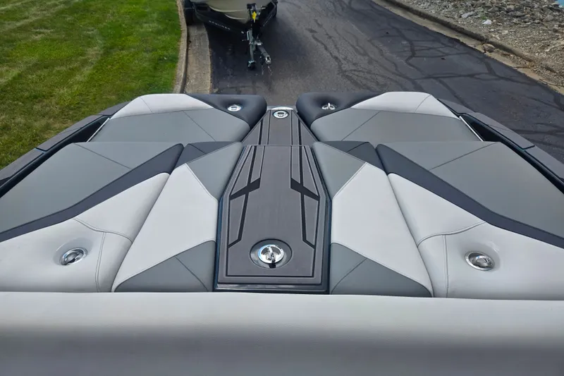 Slide: The Image of 2025 Centurion Nv233 boat interior with sleek, modern upholstery design. - 15
