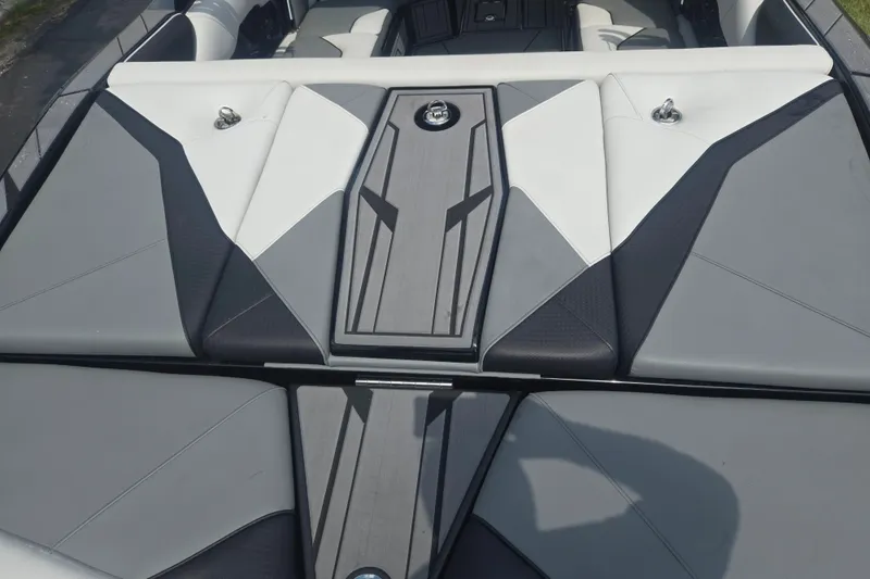 Slide: The Image of 2025 Centurion Nv233 boat interior with sleek, modern upholstery design. - 21