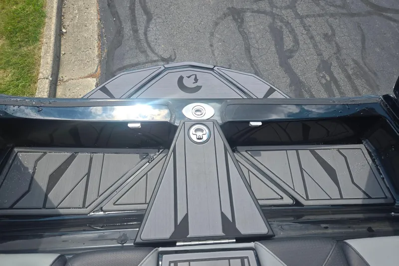 Slide: The Image of Rear deck of 2025 Centurion Nv233 boat with sleek design and modern detailing. - 20