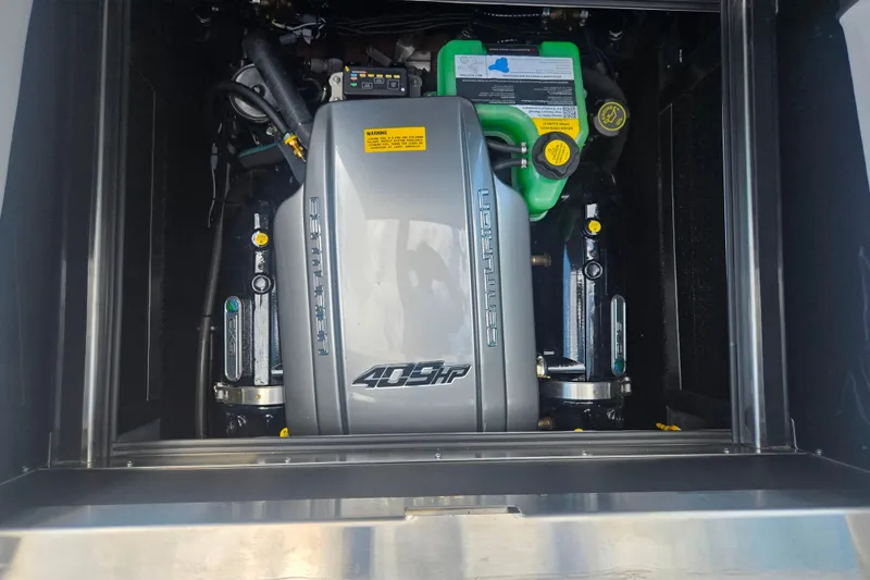 Slide: The Image of 2025 Centurion Nv233 engine compartment showcasing 409 horsepower engine components. - 16