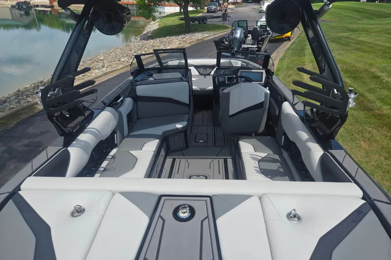 Slide: The Image of Interior of 2025 Centurion Nv233 boat with sleek seating and modern design. - 22