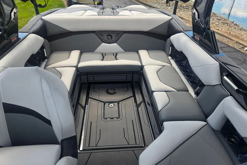 Slide: The Image of Luxurious interior of 2025 Centurion Nv233 boat with spacious seating and sleek design. - 13