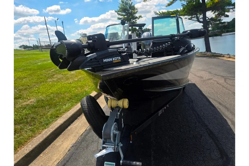 Slide: The Image of 2023 Alumacraft Competitor 165 Sport boat with Minn Kota Terrova motor on a sunny day. - 7