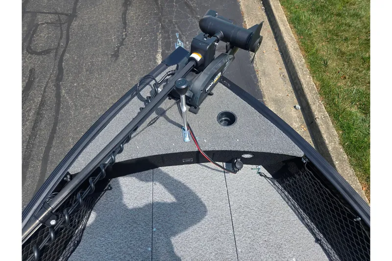 Slide: The Image of 2023 Alumacraft Competitor 165 Sport boat deck with trolling motor and storage. - 18