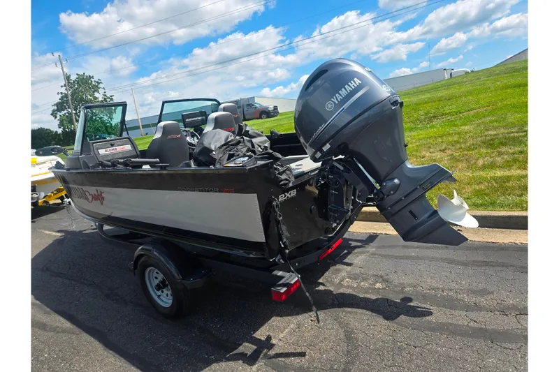 Slide: The Image of 2023 Alumacraft Competitor 165 Sport boat with Yamaha outboard motor on trailer. - 3