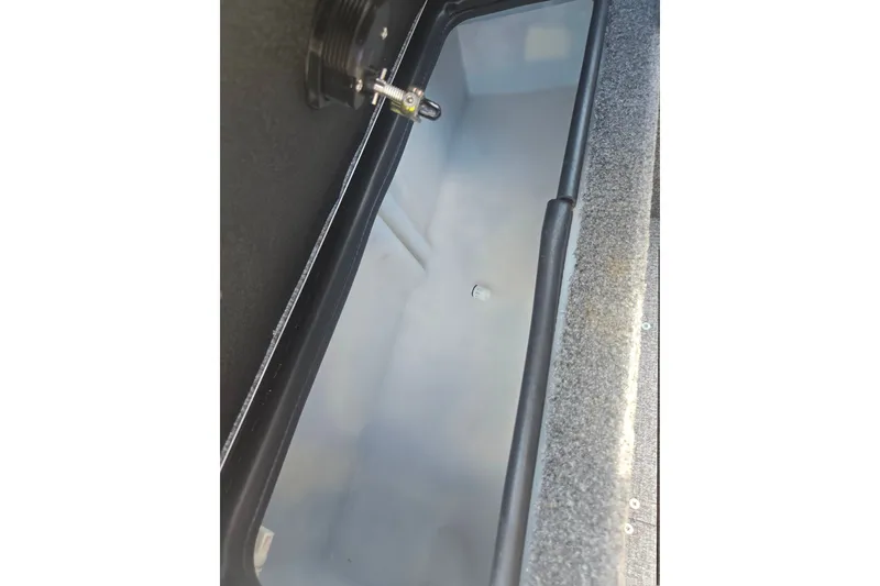 Slide: The Image of Livewell compartment in 2023 Alumacraft Competitor 165 Sport boat. - 23
