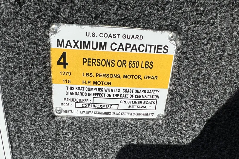 Slide: The Image of 2026 Crestliner XF 189 capacity label: 4 persons or 650 lbs, 115 HP motor. - 14