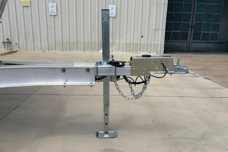 Slide: The Image of Trailer hitch of a 2022 Hurricane SunDeck Sport 201 OB boat, parked on concrete. - 34