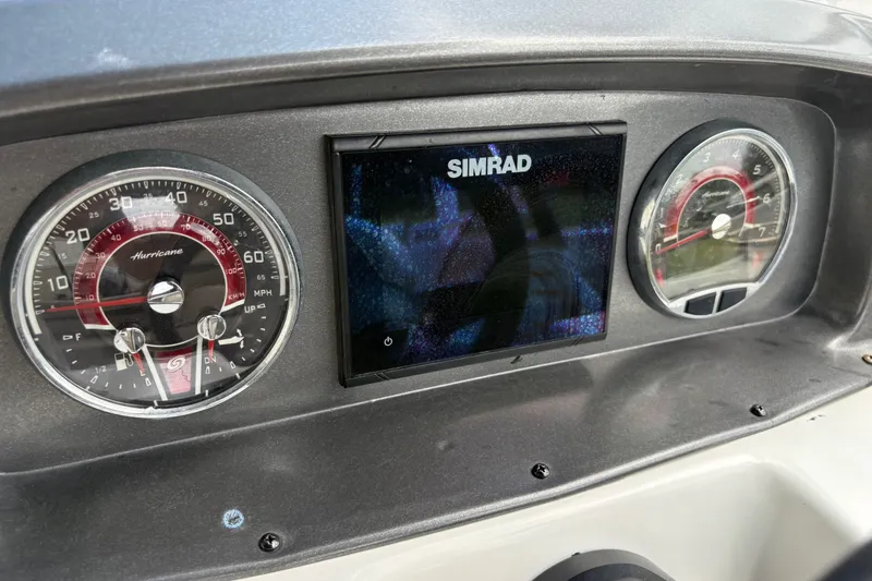 Slide: The Image of Dashboard of 2022 Hurricane SunDeck Sport 201 OB with Simrad display and gauges. - 29