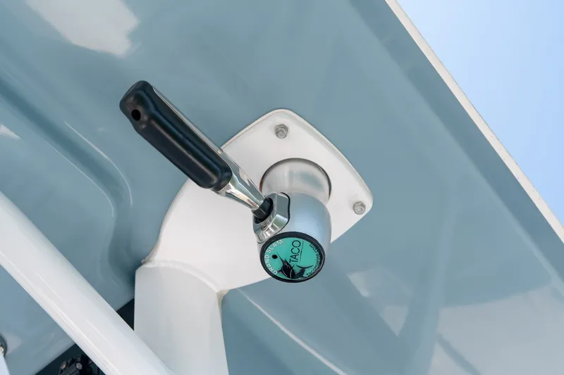 Slide: The Image of Close-up of a 2024 Sea Hunt Ultra 265SE boat handle mechanism. - 23
