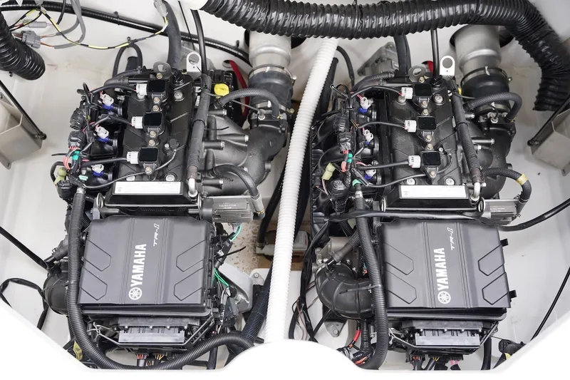 Slide: The Image of Twin Yamaha TR-1 engines in a 2022 Yamaha Boats AR210. - 2