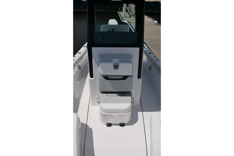 Slide: The Image of 2027 Blackfin 262 HB boat interior with sleek white seating and modern design. - 14