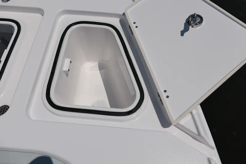 Slide: The Image of Open storage compartment on 2027 Blackfin 262 HB boat, showcasing sleek design and functionality. - 27