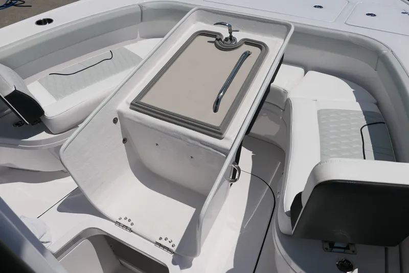Slide: The Image of Interior view of 2027 Blackfin 262 HB boat with seating and storage. - 17