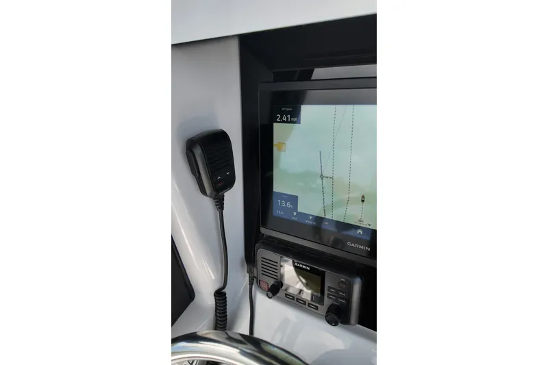 Slide: The Image of Garmin navigation system on 2027 Blackfin 262 HB boat dashboard. - 31