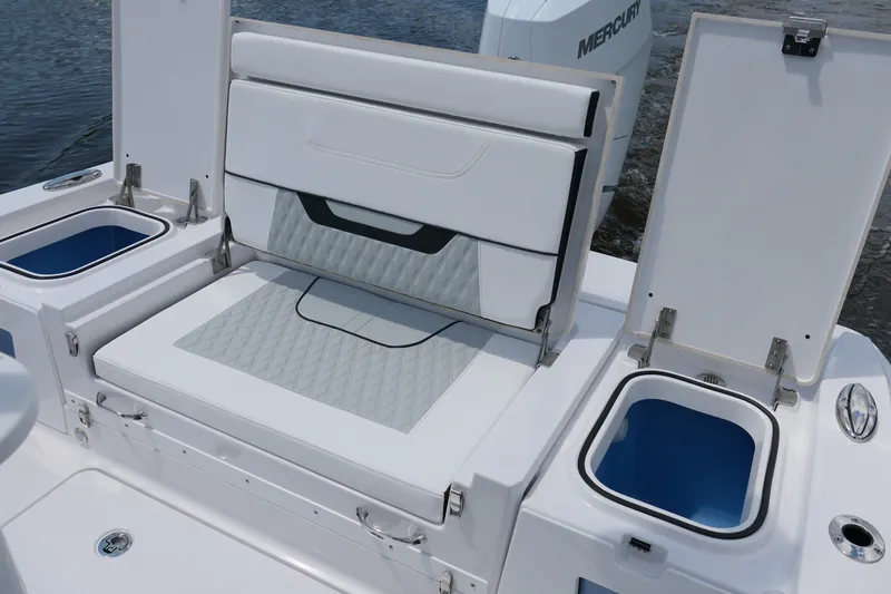 Slide: The Image of 2027 Blackfin 262 HB boat seating and storage compartments on deck. - 22