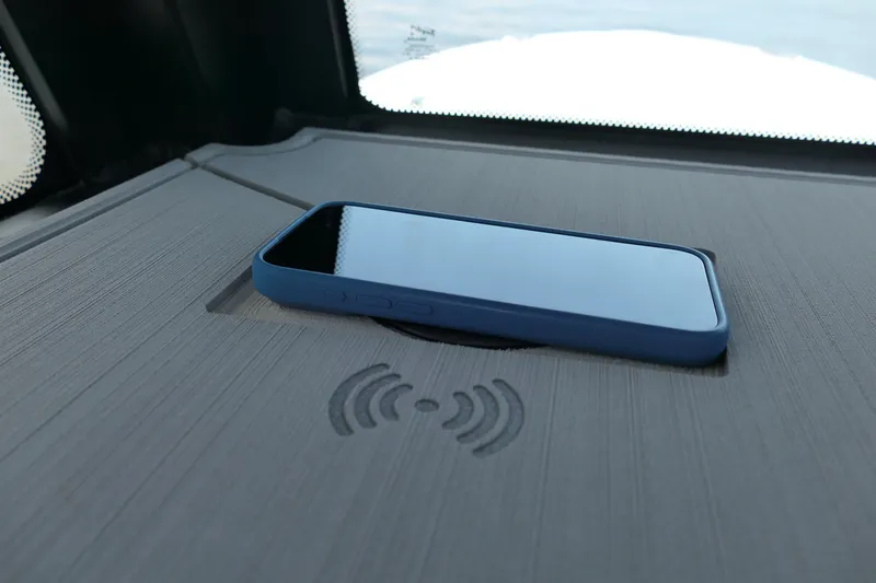 Slide: The Image of Smartphone on Blackfin 262 HB 2027 boat's wireless charging pad, showcasing modern technology integration. - 20