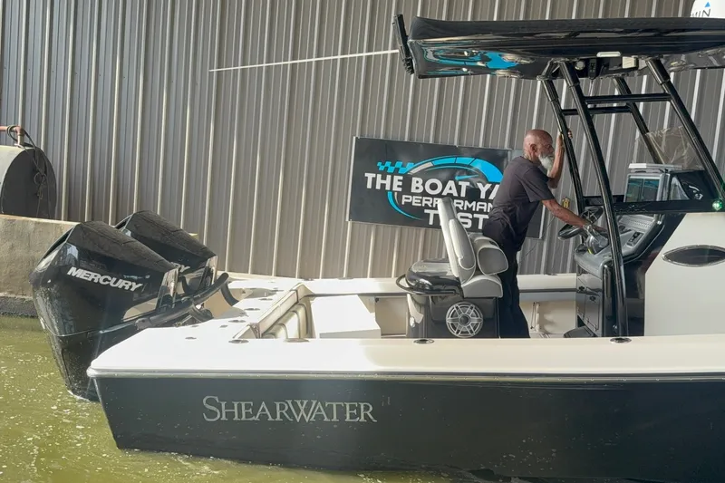 Slide: The Image of 2020 ShearWater 270 Carolina Flare boat with Mercury engines in a performance test setting. - 15