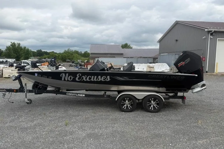 The Image of 2021 Crestliner MX 21 boat on trailer, labeled "No Excuses," parked outdoors. - 0