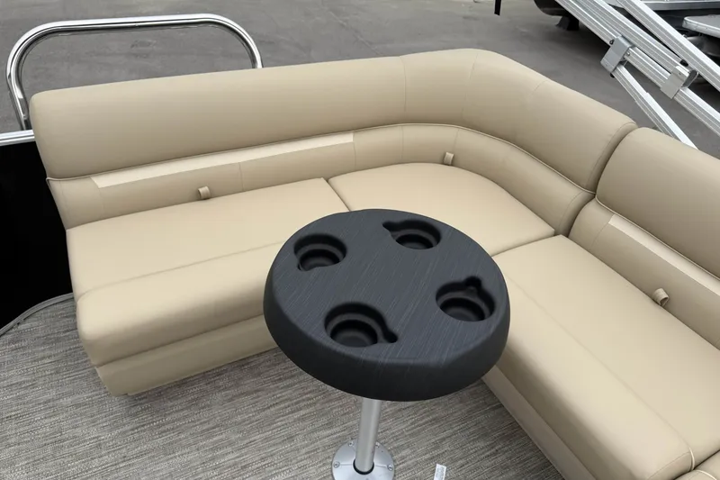 Slide: The Image of Luxurious seating on 2027 Godfrey Xperience 2086 CX pontoon boat with cup holder table. - 15