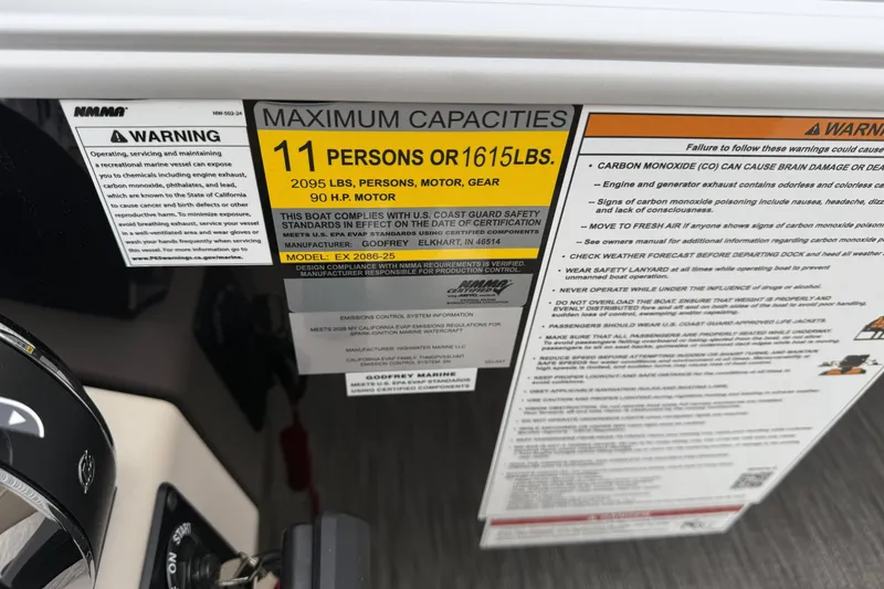 Slide: The Image of Capacity label on 2027 Godfrey Xperience 2086 CX boat, max 11 persons or 1615 lbs. - 18