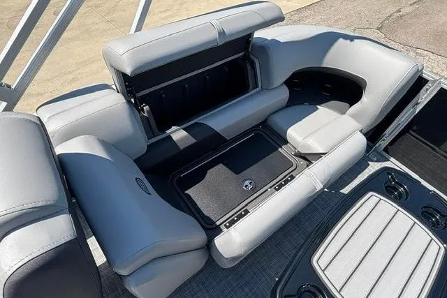 Slide: The Image of 2026 Sun Tracker Party Barge 22 XP3 interior seating with storage compartments. - 23