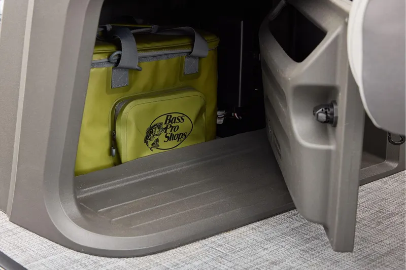 Slide: The Image of Manufacturer Provided Image: Storage compartment in 2026 Sun Tracker Party Barge 22 XP3 with Bass Pro Shops cooler. - 63