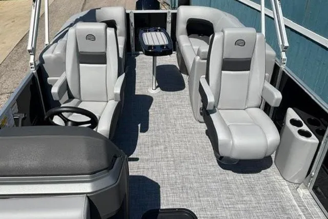 Slide: The Image of 2026 Sun Tracker Party Barge 22 XP3 interior with gray seating and table. - 15