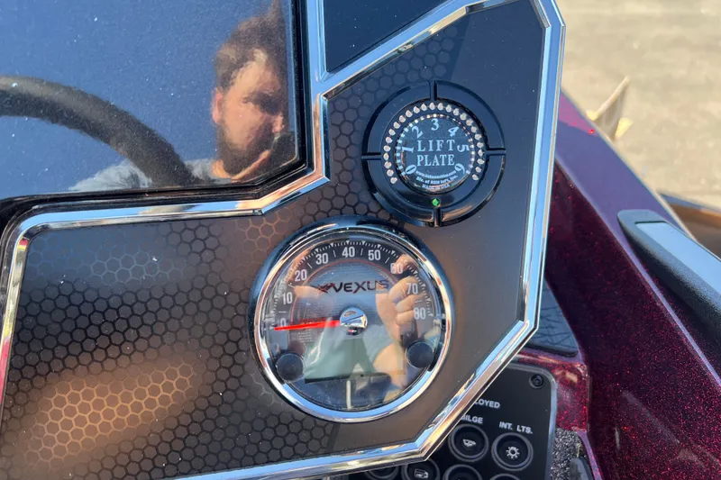 Slide: The Image of 2026 Vexus VXs20 dashboard with lift plate control and speedometer. - 17