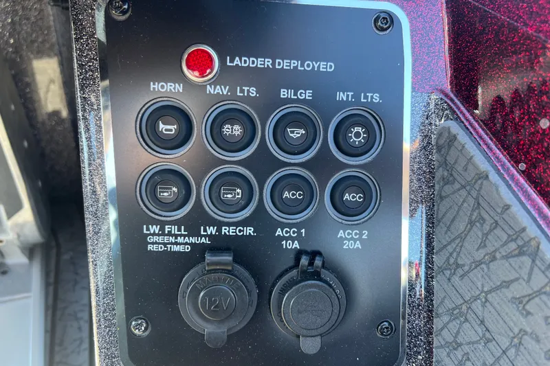 Slide: The Image of Control panel of 2026 Vexus VXs20 boat with various switches and indicators. - 15