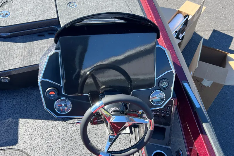 Slide: The Image of 2026 Vexus VXs20 boat dashboard with steering wheel and control panel. - 14