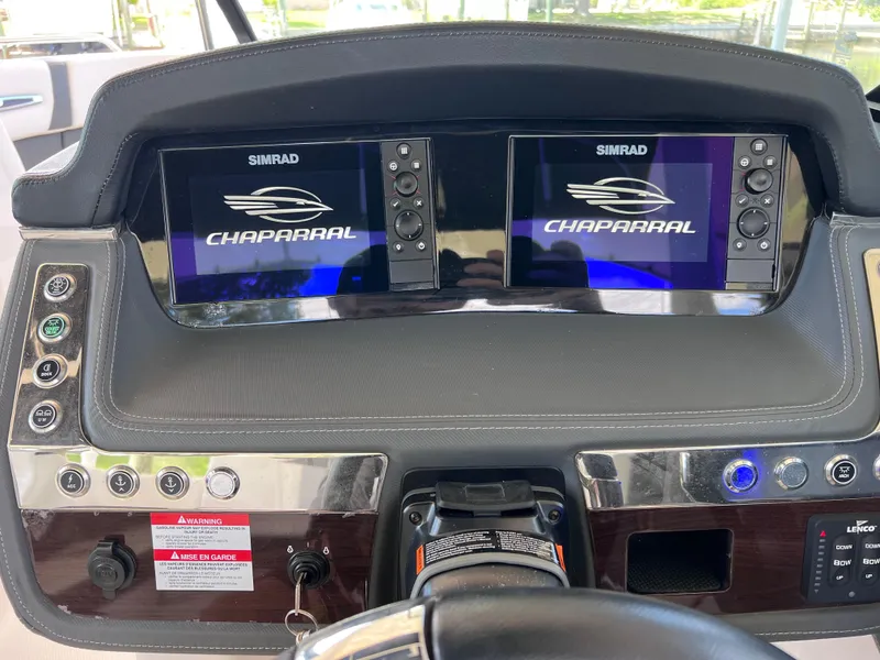 Slide: The Image of Dashboard of 2022 Chaparral 267 SSX OB with dual Simrad displays. - 43