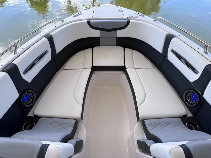 Slide: The Image of 2022 Chaparral 267 SSX OB boat interior with luxurious seating and modern design. - 29