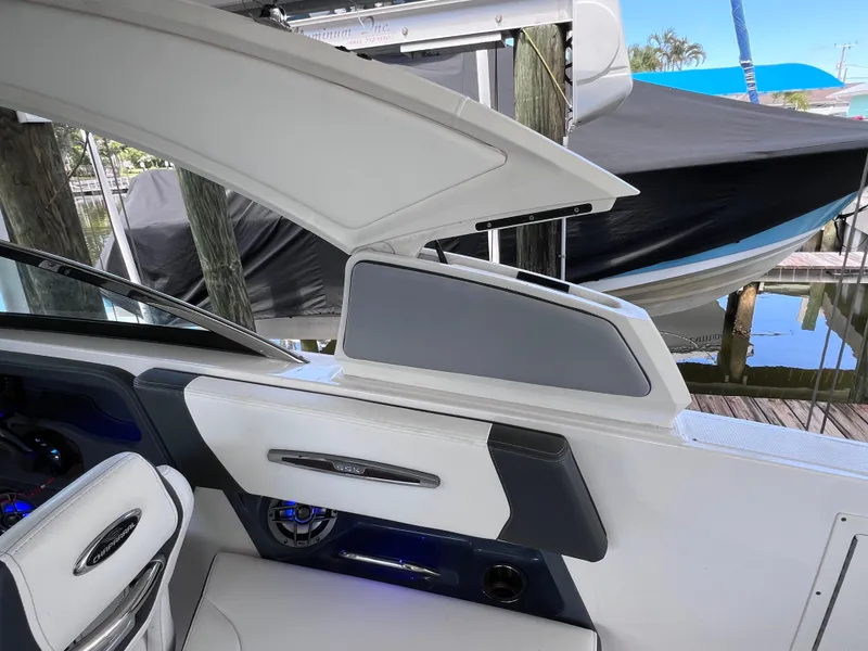 Slide: The Image of 2022 Chaparral 267 SSX OB boat interior with sleek design and modern features. - 48