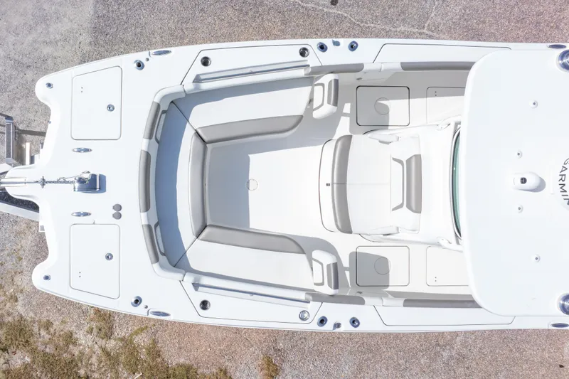 Slide: The Image of Overhead view of 2022 World Cat 325 CC boat interior, showcasing seating and storage layout. - 13