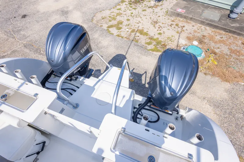 Slide: The Image of 2022 World Cat 325 CC boat with dual Yamaha outboard engines, aerial view. - 61