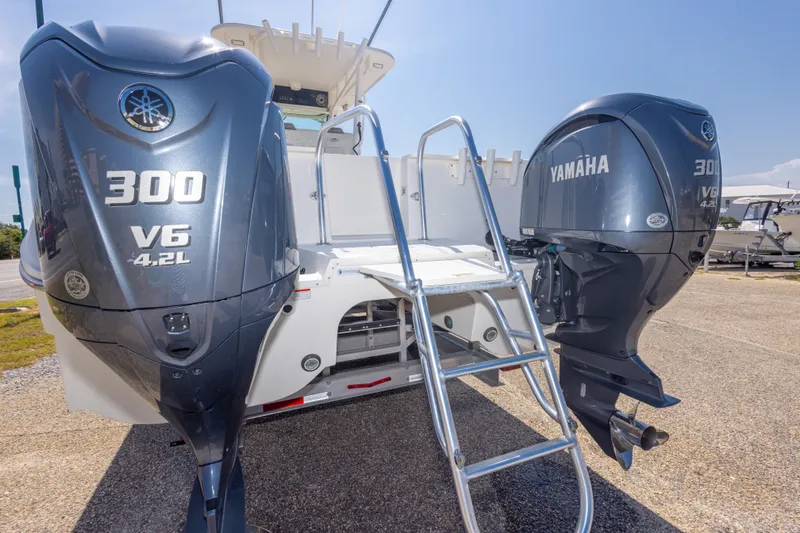 Slide: The Image of 2022 World Cat 325 CC with twin Yamaha 300 V6 engines and ladder. - 64