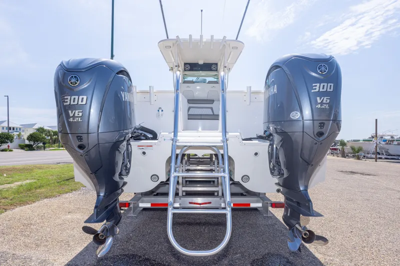 Slide: The Image of 2022 World Cat 325 CC with dual Yamaha 300 V6 engines, rear view. - 17
