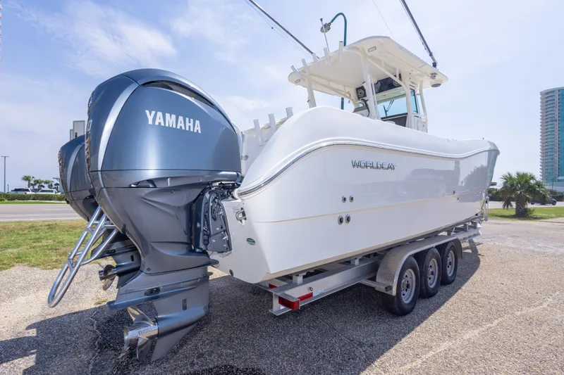 Slide: The Image of 2022 World Cat 325 CC boat with Yamaha engines on a trailer. - 15
